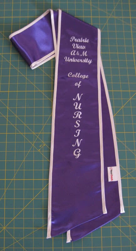 Purple graduation sash nursing